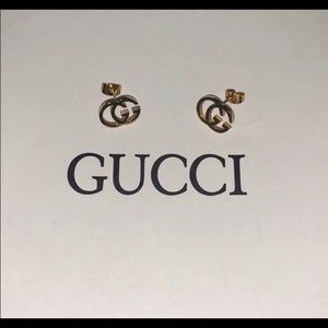 Gold Gucci studs